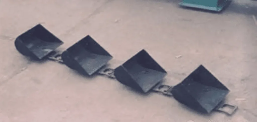 Cadena con cangilones metálicos para transporte continuo de materiales