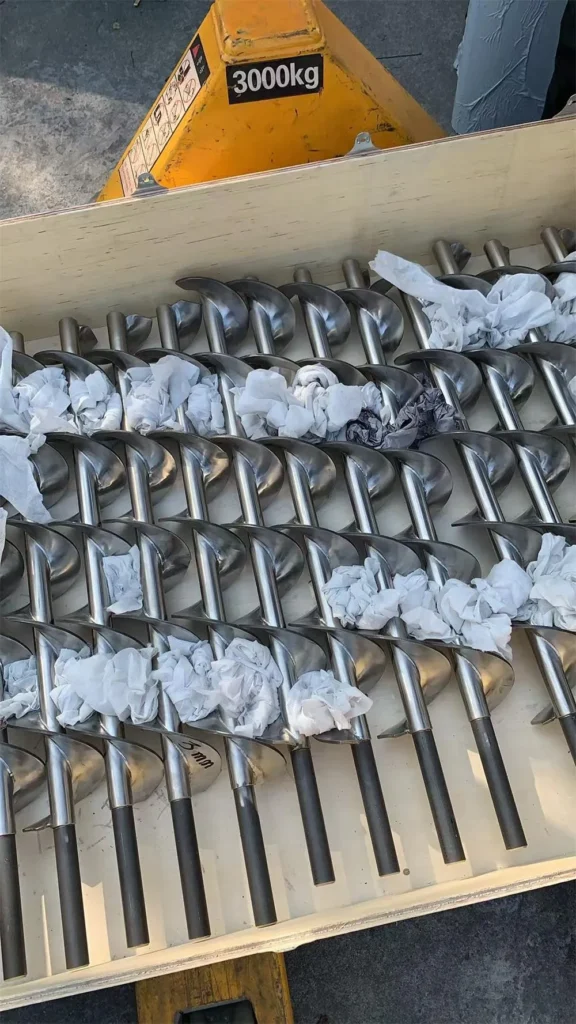 tornillos sinfín de acero inoxidable para sistemas de transporte y procesamiento industrial